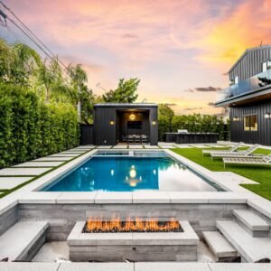 luxurious-backyard-with-pool-and-fire-pit-at-sunse